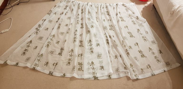 WHITE VOILE CURTAINS WITH GOLD CHINESE LETTER DETAIL