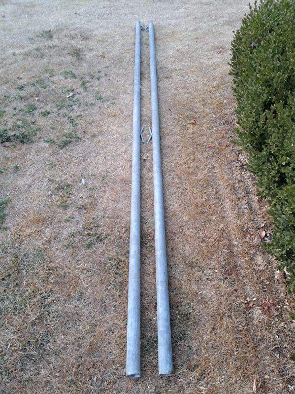 A pair of galvanised steel washing line poles