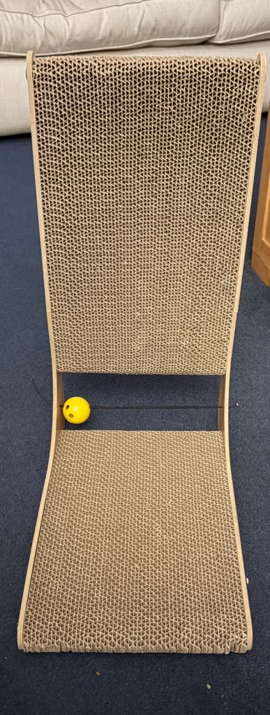 IKEA Utsadd cat house and L shaped layered cardboard cat scratching post