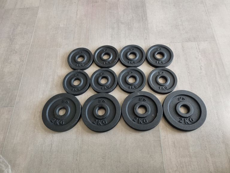 16kg of new cast iron weight plates 1 inch  