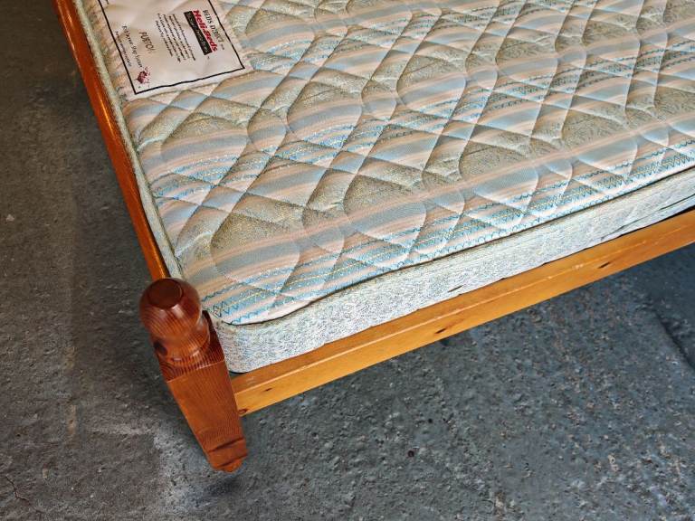 Single pine bed with sprung mattress 