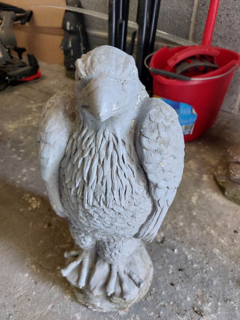 Bird statue in stone