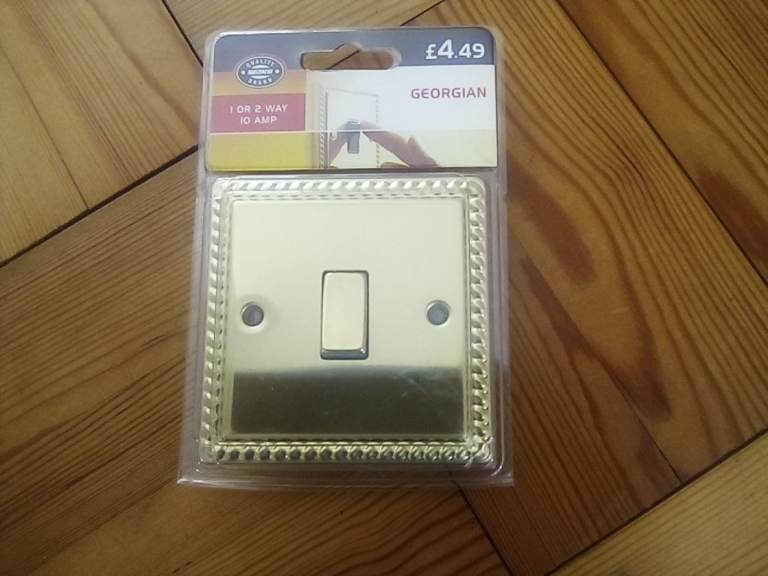 Georgian style gold coloured  switch cover.