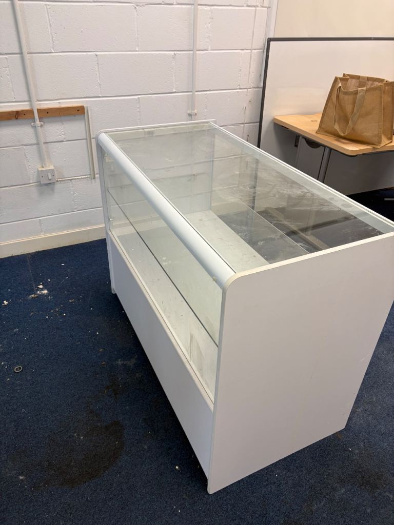 White Shop Display Counter with Glass Top – Good Condition