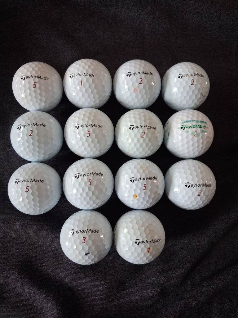 14 Used Taylor Made TP5 Golf Balls. 