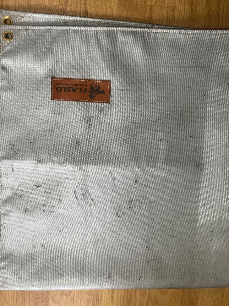 Welding blanket fire retardant covering for stove