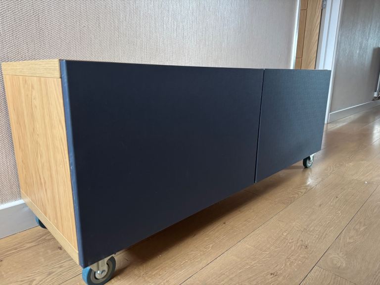 Blue and oak veneer tv/media cabinet on casters