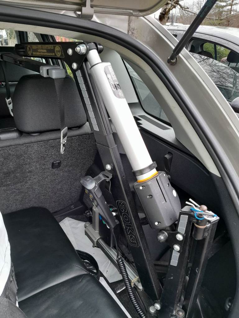 Car hoist arm for disabled people equipment.