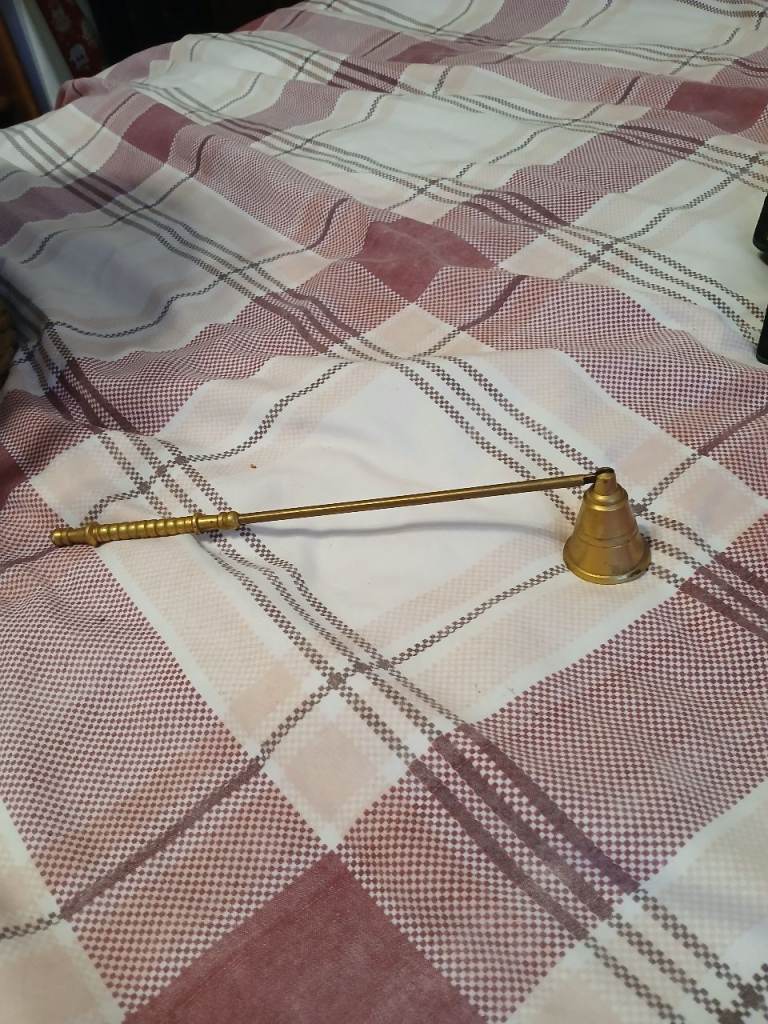 Small brass candle snuffer