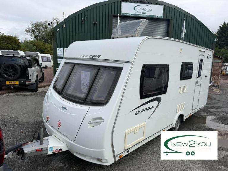 2012 Lunar Quasar 494 - 4 Berth SIDE DINETTE Caravan - STOCK H168