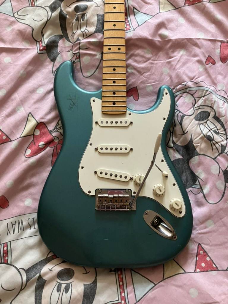 Fender player stratocaster made in mexico, used, electric guitar with a little orange amp