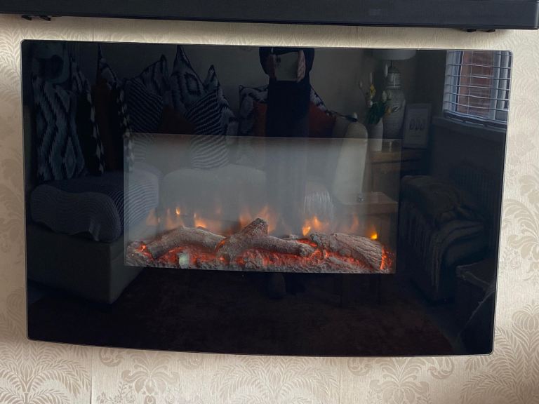 Curved glass wall mounted electric fireplace