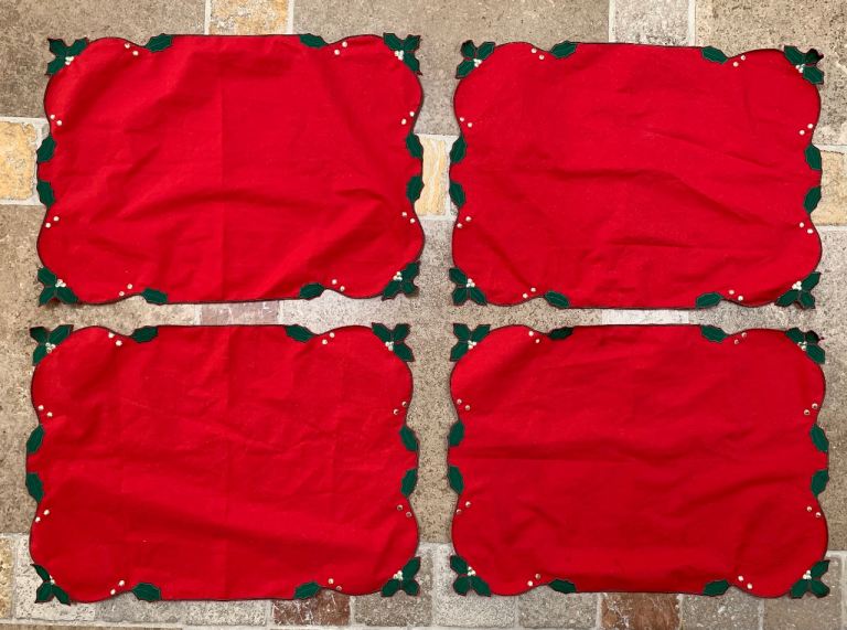 Four red festive placemats 