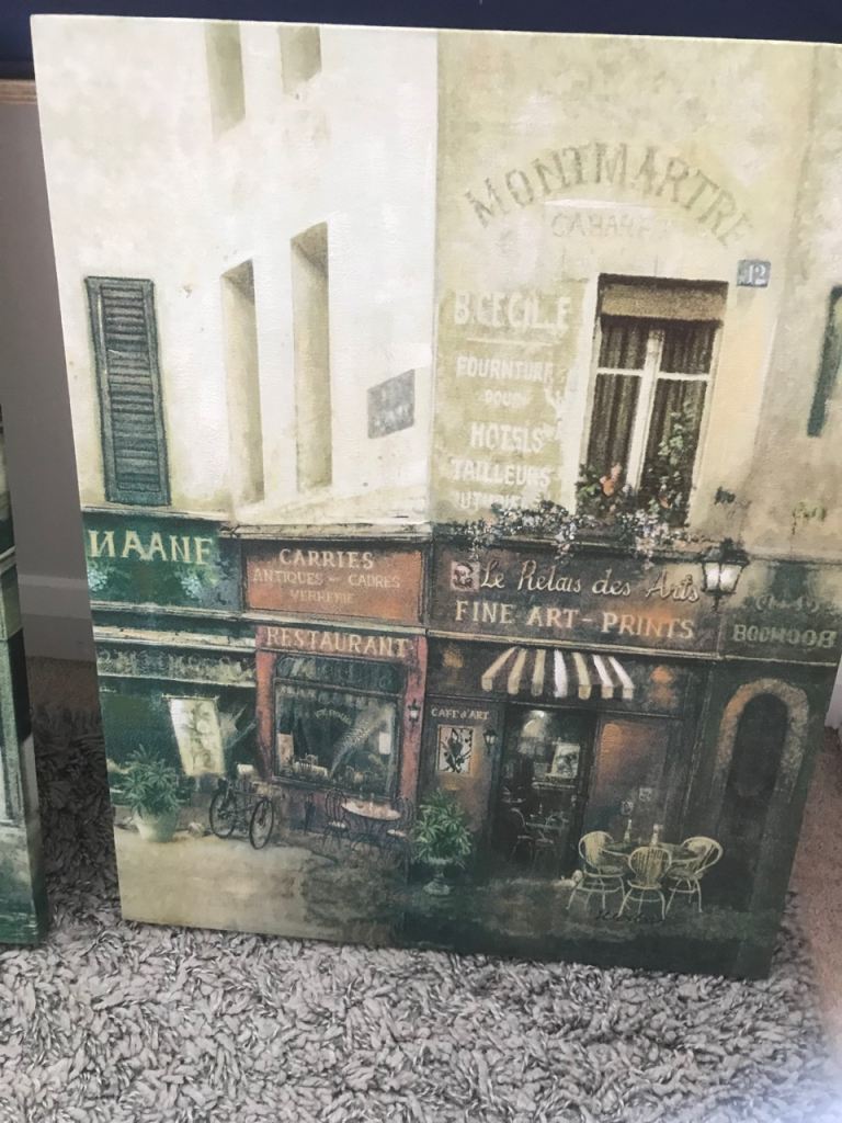 2 canvases depicting a French cafe scene