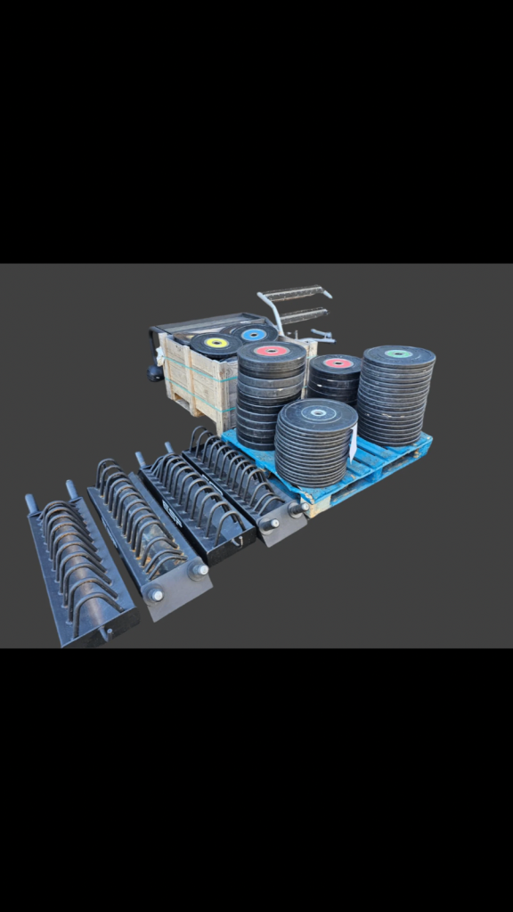 Technogym Bumper Competition Colour coded weight plates with Sandwich racks