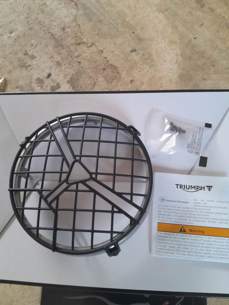 Triumph 400 headlamp grill and bezel