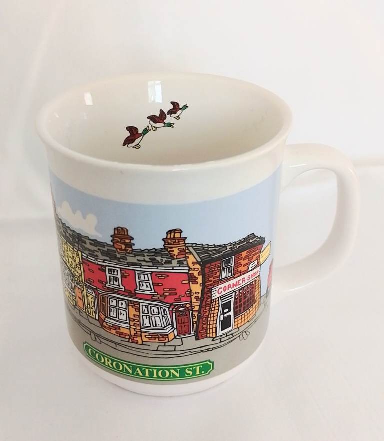 Coronation street mug with Hilda Ogdan flying ducks inside