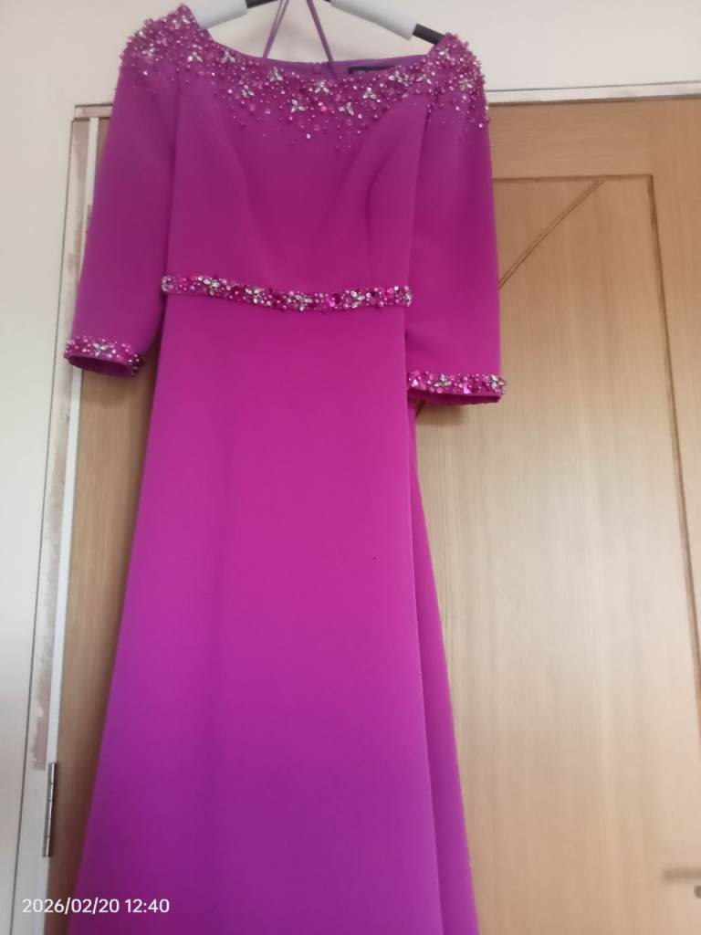 Mother of the brides outfit dress and hat to match