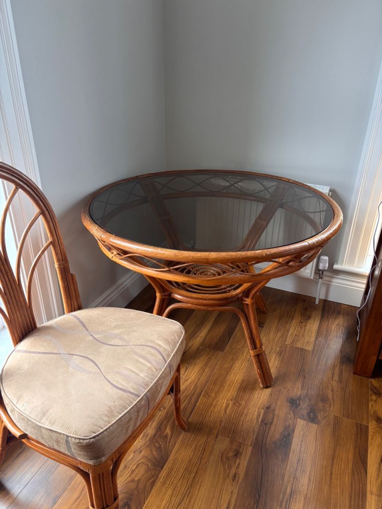 Cane table and 4 chairs 