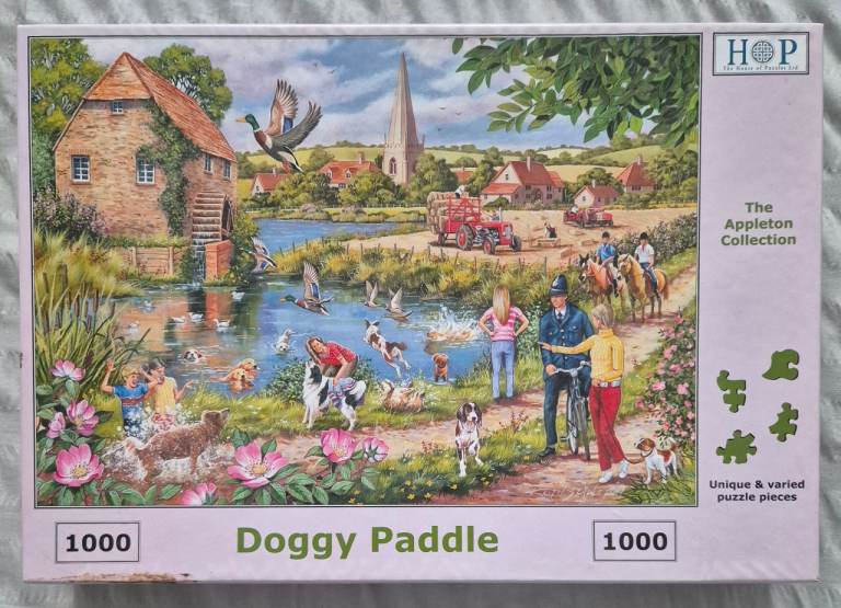 House of Puzzles Doggy Paddle 1000-piece jigsaw puzzle.