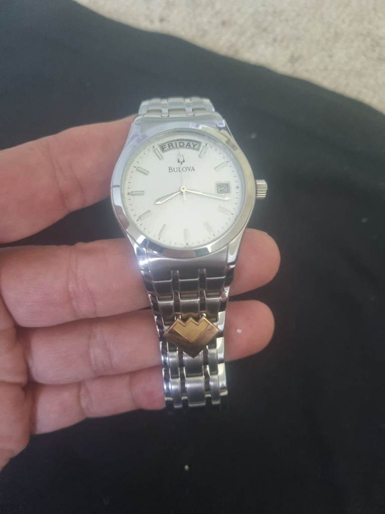 Very rare Bulova Watch with gold Day/Date Display – Silver, Good Condition