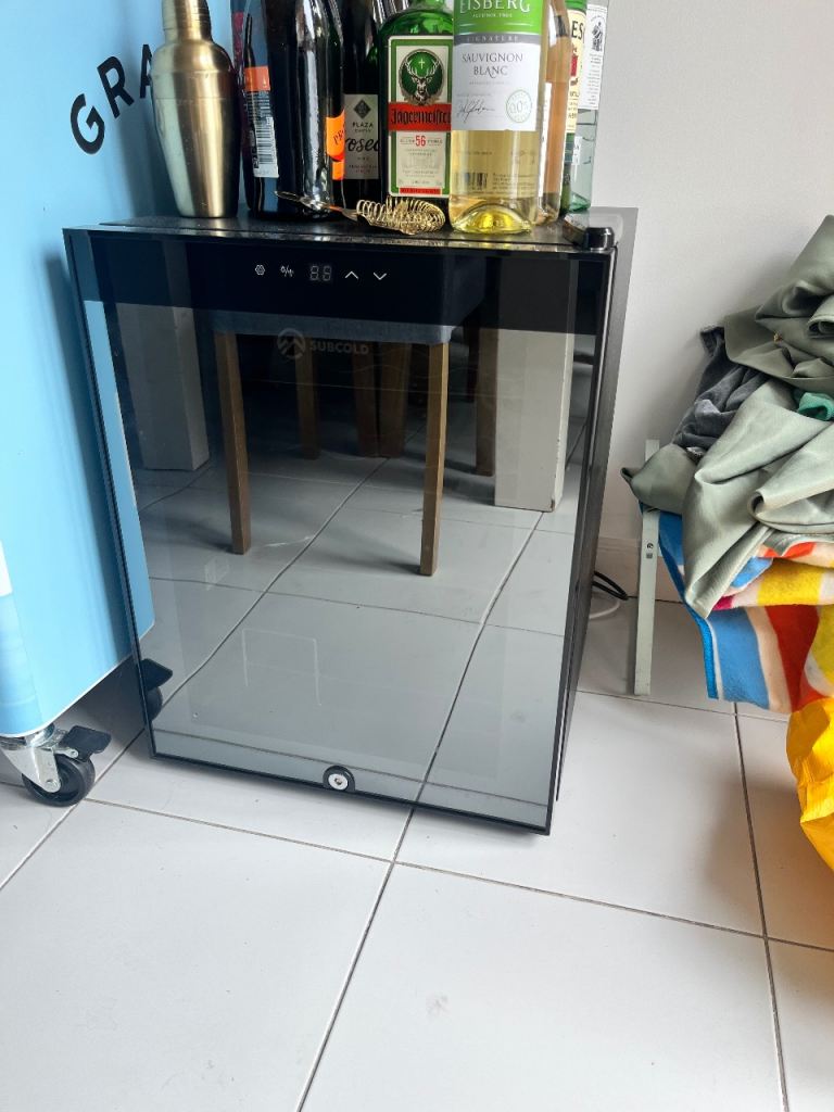 Compact Black Freestanding Fridge with Glass Door – Good Condition