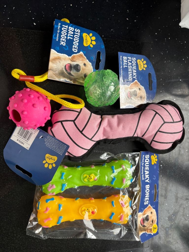 A bundle of NEW dog toys