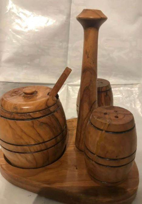 Wooden salt and pepper pots with honey pot