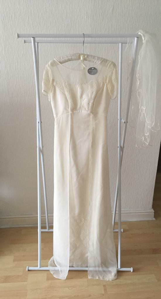 Wedding dress, voile overlay which forms train, embroidered detail 8