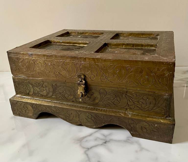 Unique ornate brass covered wooden chest