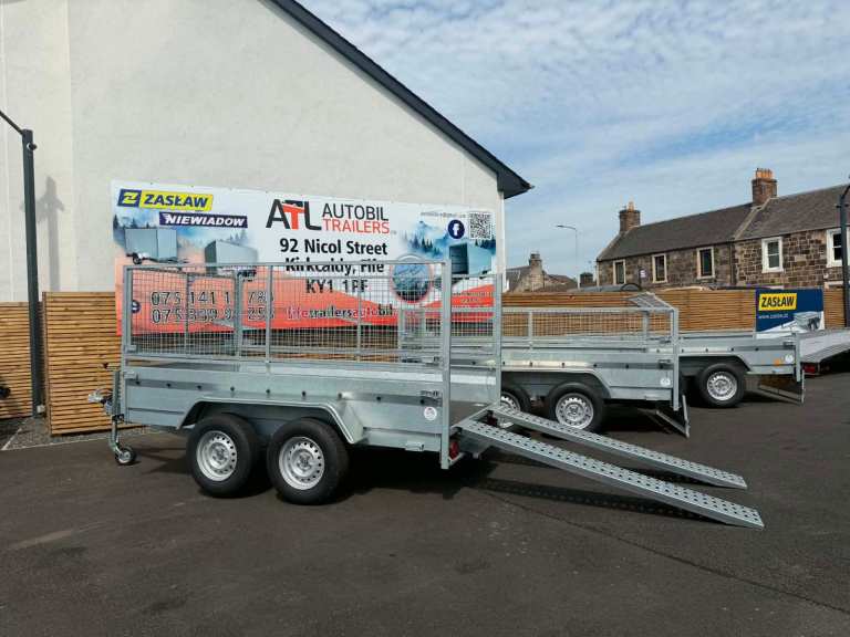 BRAND NEW 10FT X 5FT TWIN AXLE MASTER HEAVY DUTY TRAILER WITH 80CM MESH AND RAMPS 2700KG BRAKED