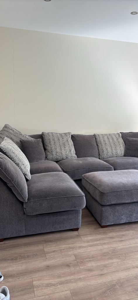 L-shaped sofa and footstool 
