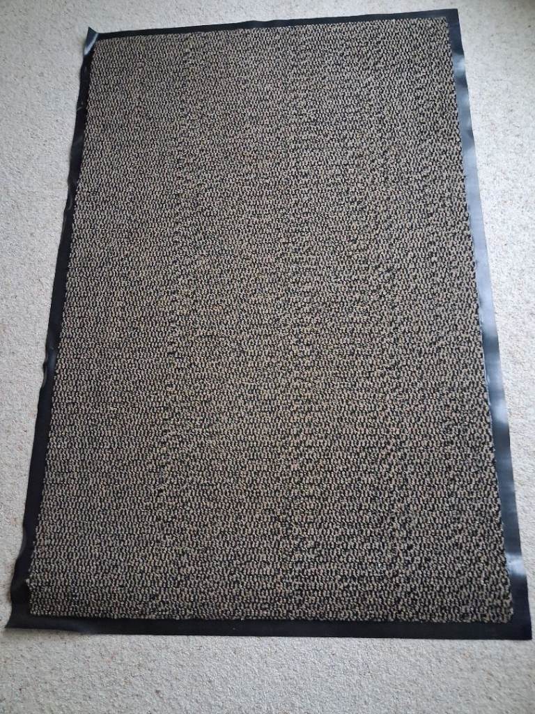 Rubber backed mat