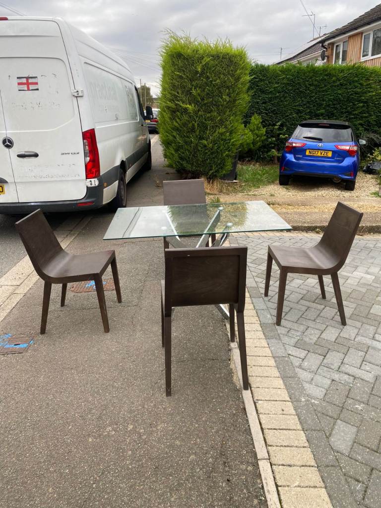 Glass dining table with 4x chairs for £100
