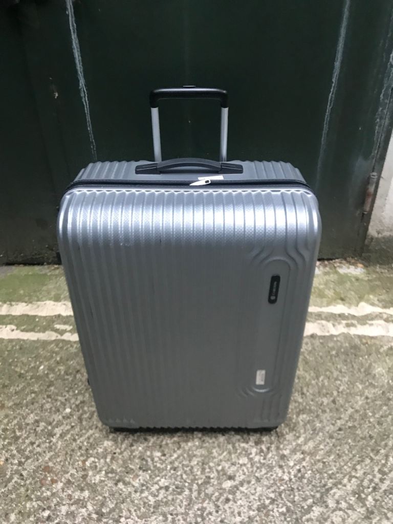4 wheels hardsshell Suitcase  size 75cmx 52cm x 30cm