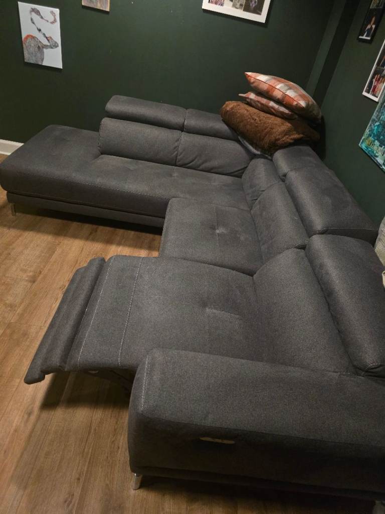 Couch with built in recliner chair.