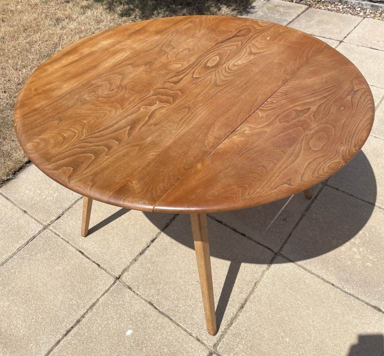 1950's BLONDE ERCOL CIRCULAR DROP LEAF DINING TABLE MODEL 384,