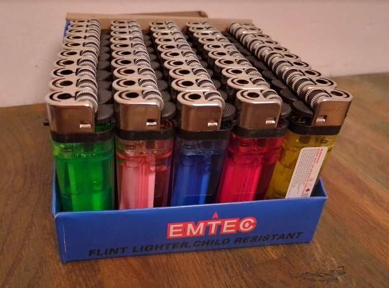 Sealed box of 50 disposable lighters central London bargain