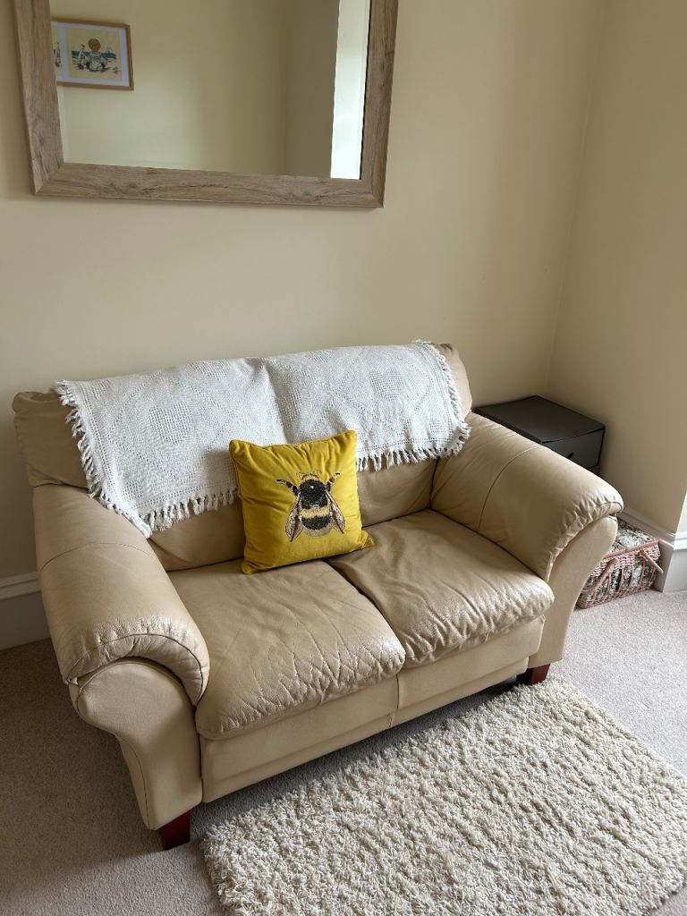 Cream Leather Two-Seater Sofa – Good Condition