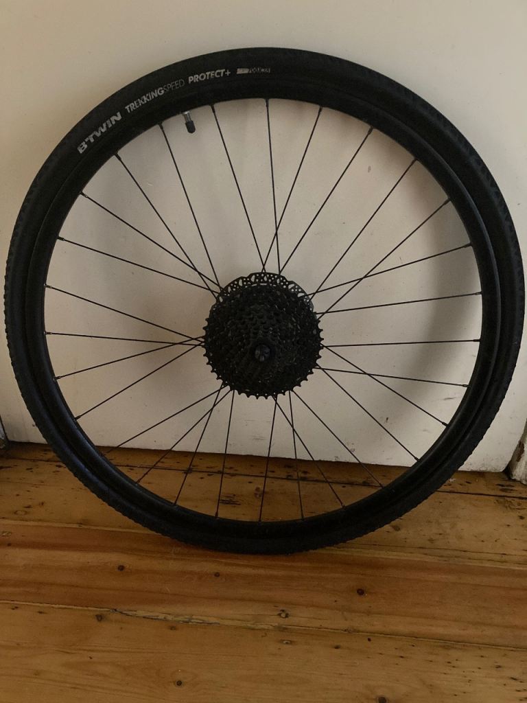 BTwin 700 x 38 tyre, rim and 10 speed cassette