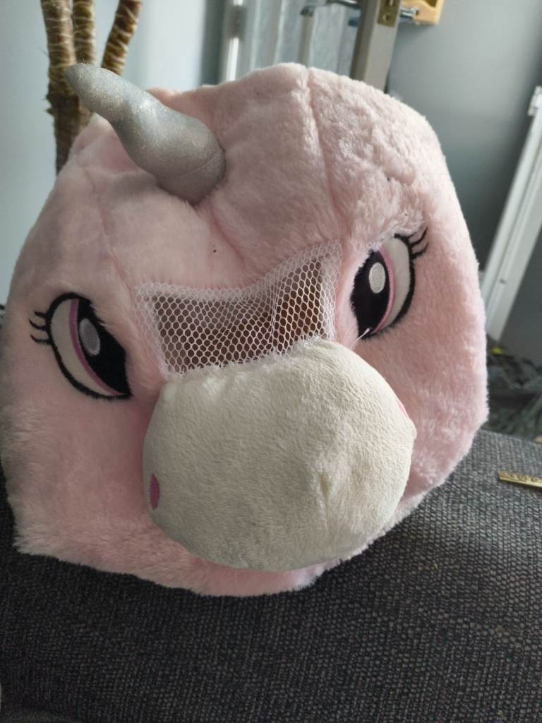Pink unicorn head will fit children or adult 