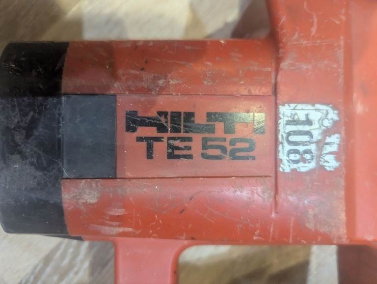 Reliable Hilti TE52 Breaker Drill comes with large drill bits  and case