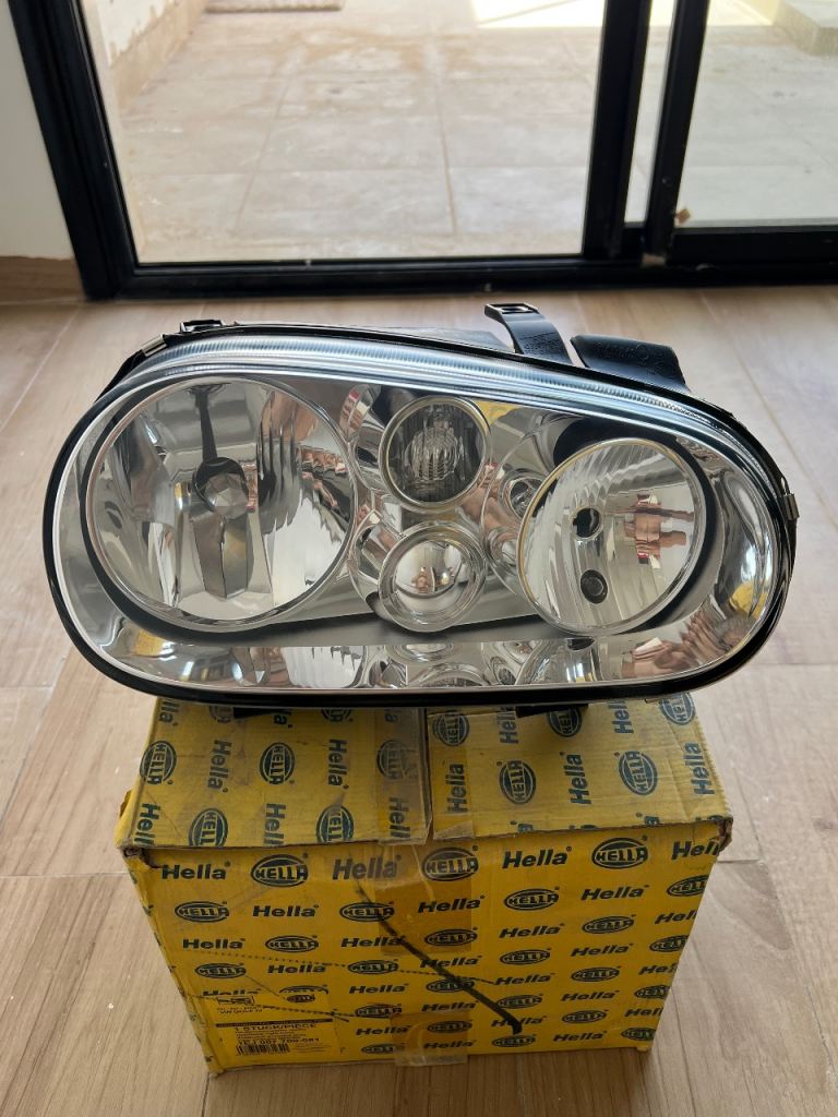 VW Golf 4 Headlight RIGHT Hella ORIGINAL NOS NEW 1EJ 007 700-081
