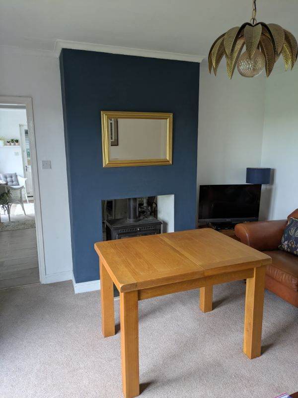 Extending table (four chairs, but could be sold separately).