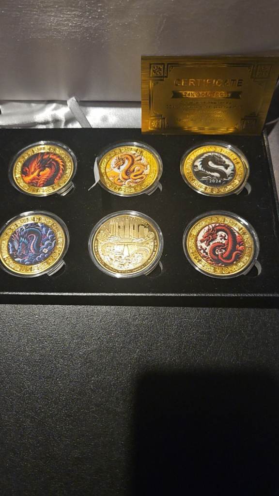 Commerative coins 24 carat gold 