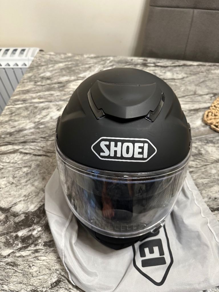 Shoei GT-Air Size M in black with Cardo Bluetooth intercome.