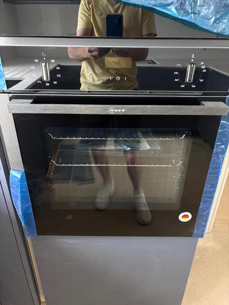 Neff slide&hide electric oven and microwave set