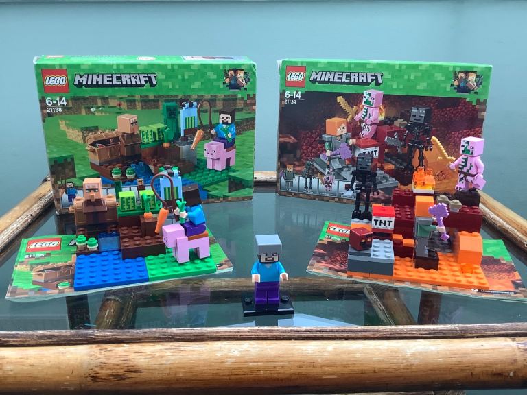 2 Minecraft Lego sets.  Plus a Minecraft Minifig.  