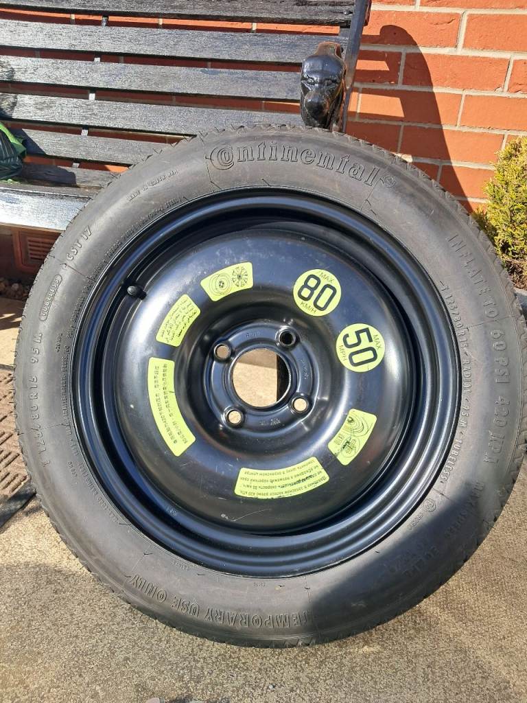 Brand new, unused space saver wheel