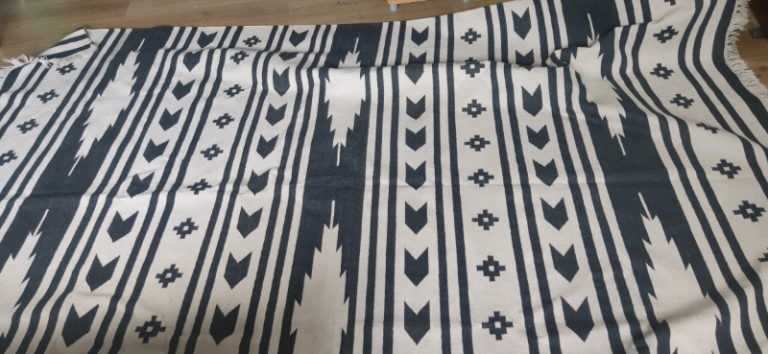 Large handwoven tassel rug